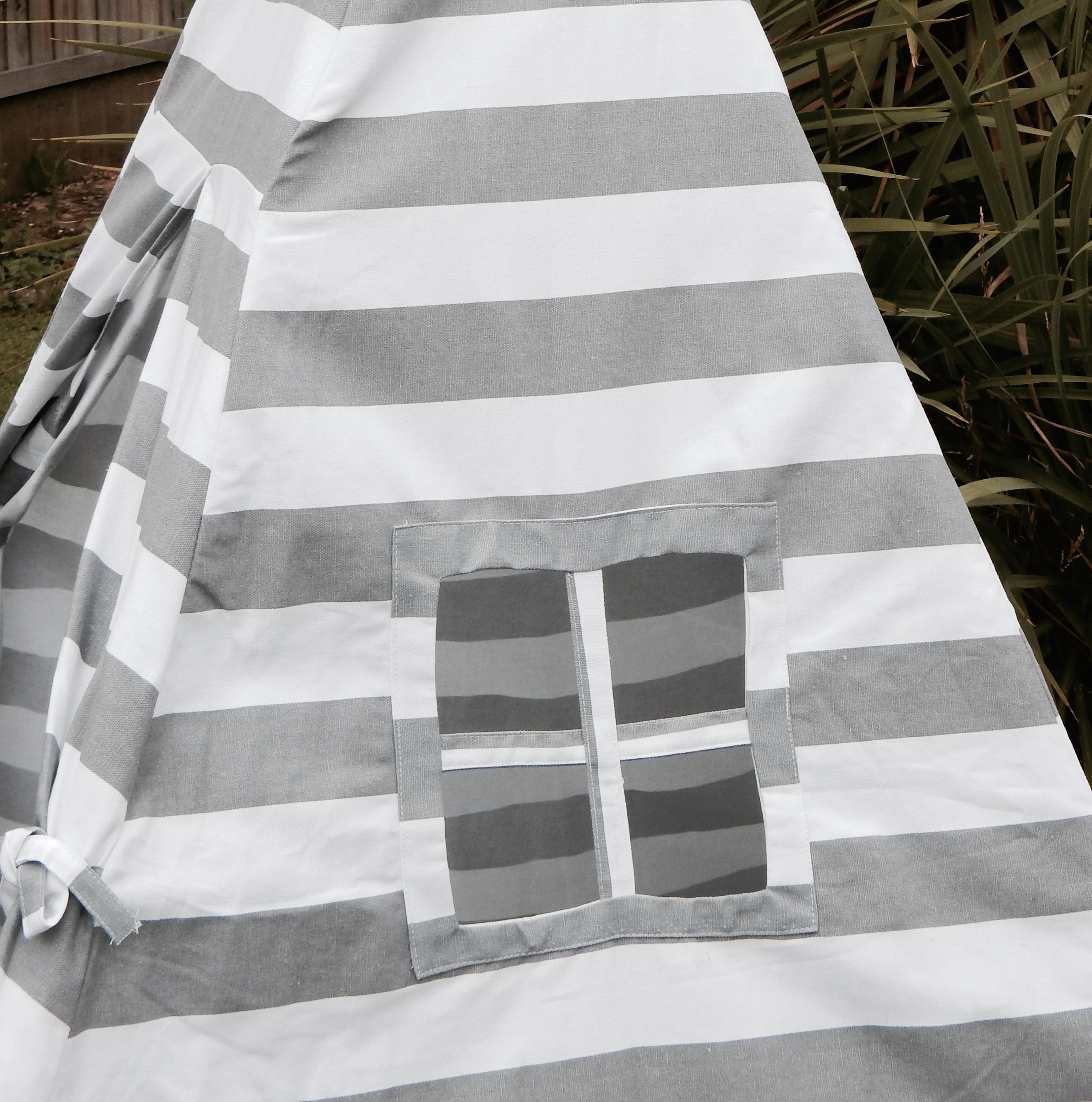 grey and white teepee side